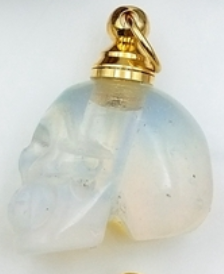 Collar de cabeza de calavera de guardián de cenizas de perfume de cristal curativo natural